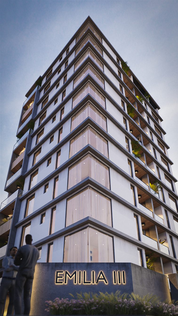 Edificio Emilia III en esquina al atardecer